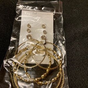 Gold tone hoops and studs